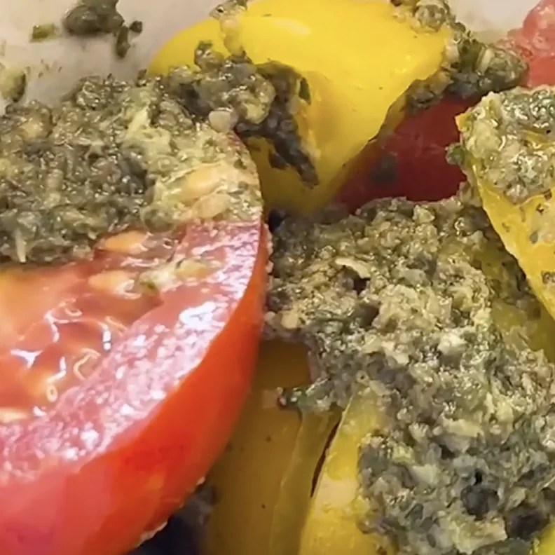 pesto on tomatoes